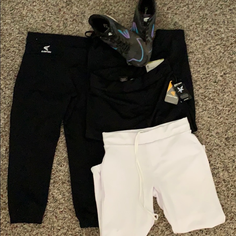 Easton women’s softball pants / softball cleats